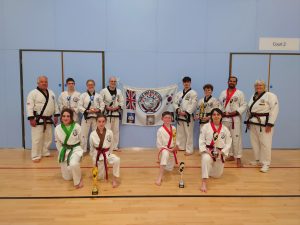 National championships team holding trophies