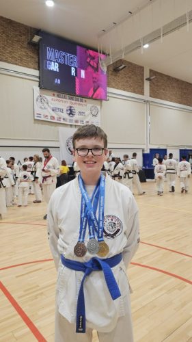 Nathan with this medals